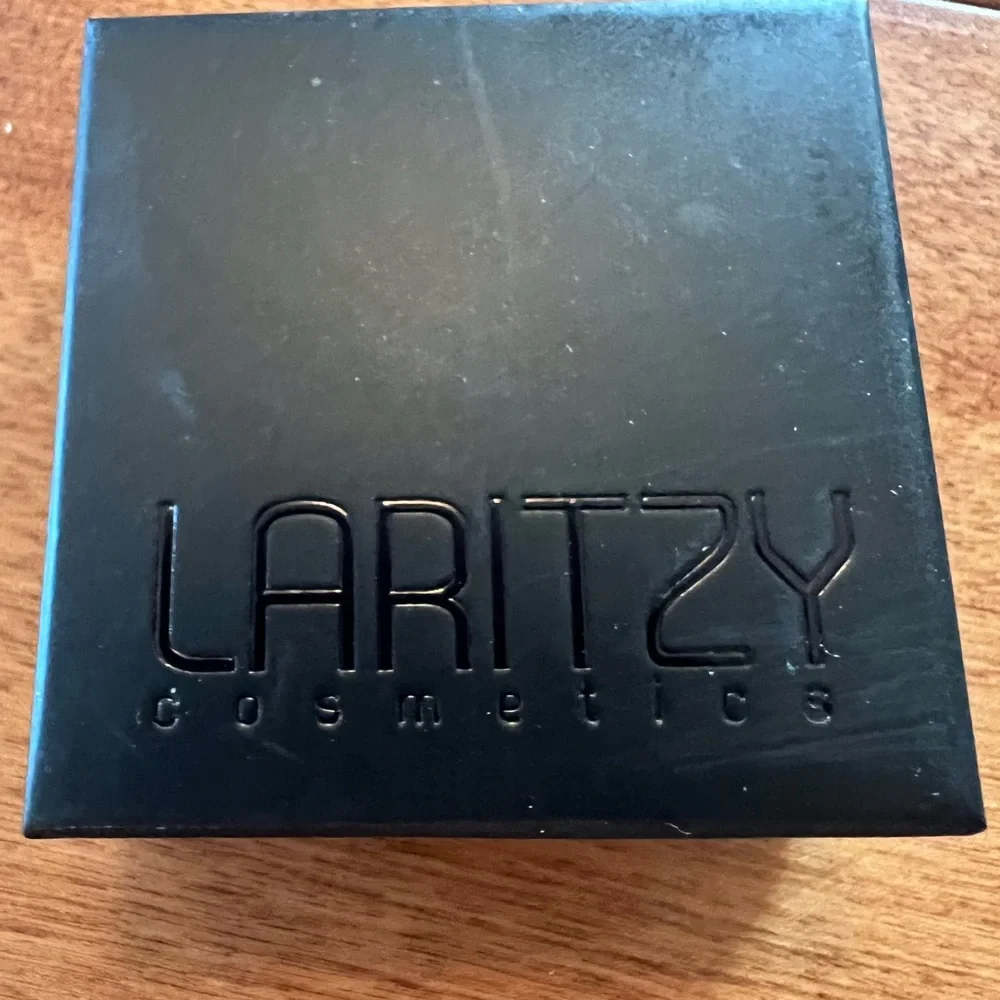 ⭐️HP!⭐️ NWT Laritzy cream hilighter in “Virtue”. Rose-gold with slight shimmer. - Picture 4 of 6